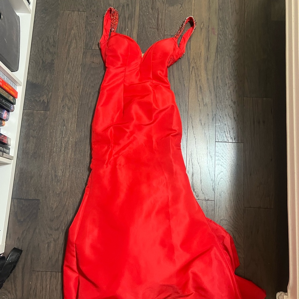 Red sherri hill prom dress with low back and gems on sleeves